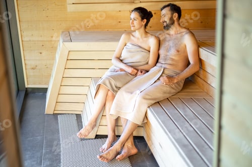 Preview: Couple resting in a sauna