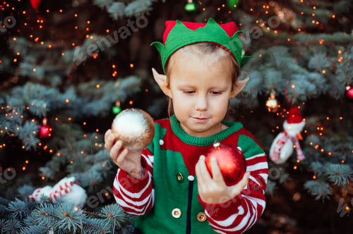 Preview: Christmas in july. Child waiting for Christmas in wood in july