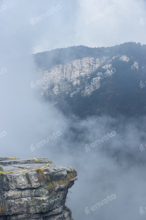 Preview: foggy valley with cliff rock