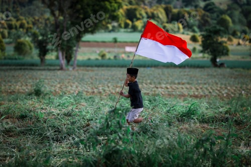 Preview: Young Child Runs with a Red and White Flag