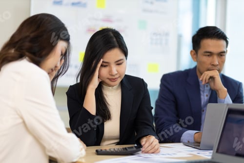 Preview: Group of business colleagues who are serious about working in the organization.