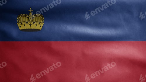 Preview: Liechtensteiner flag waving in the wind. Liechtenstein banner blowing soft silk.