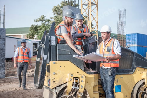 Preview: Site manager explaining to steamroller drivers about blueprint on construction site