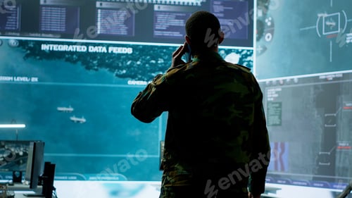 Preview: Military man answers phone call in a mission control center