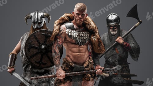Preview: Three viking from past with axes against gray background