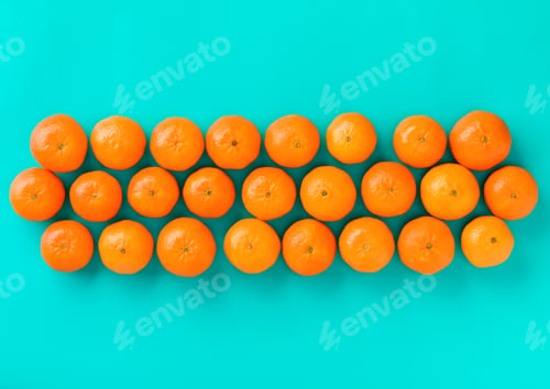 Preview: Fruit pattern of mandarin isolated on blue background. Tangerine. Flat lay, top view.