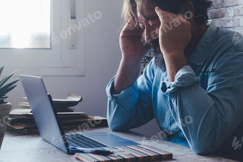 Preview: Migraine headache unhealthy condition for stress and overworking on laptop