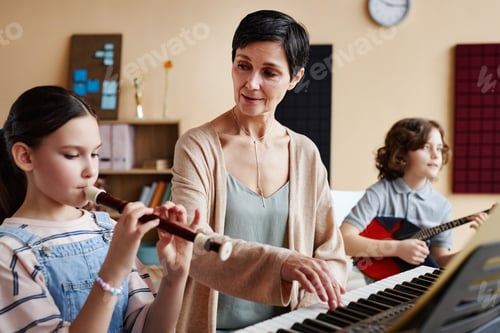 Preview: Teacher playing musical instruments with student