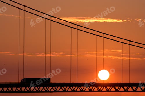 Preview: Traffic On Bridge With Red Sunset