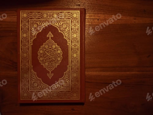 Preview: Al Quran on wooden desk