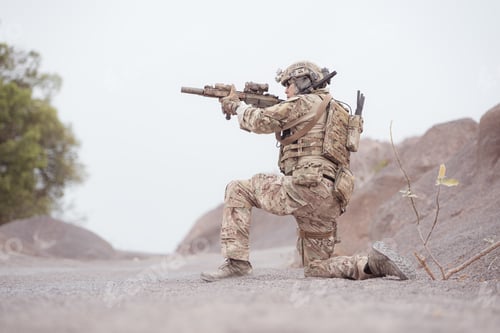 Preview: Soldiers in camouflage military uniforms carrying weapons Reconnaissance missions in rugged mountain
