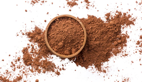 Preview: Pile of cocoa powder isolated on white background. Top view
