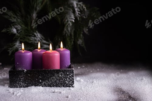Preview: Christmas eve, one pink and three purple advent candles.