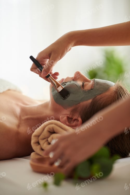 Preview: Beautician Applying Black Clay Mask