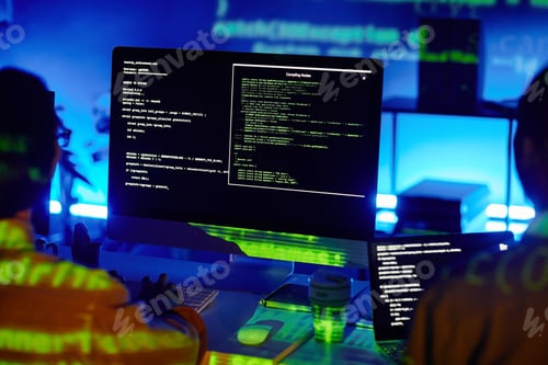 Preview: Computer screen with decoded data and two young contemporary programmers