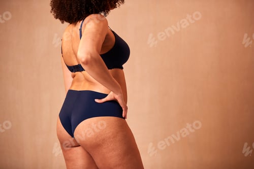 Preview: Studio Close Up Shot Of Confident Natural Woman In Underwear Promoting Body Positivity