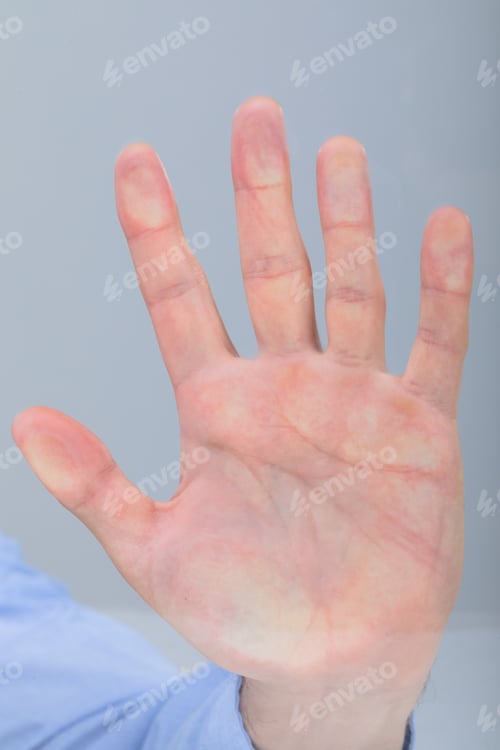 Preview: Close up of caucasian businessman touching virtual interface, isolated on grey background