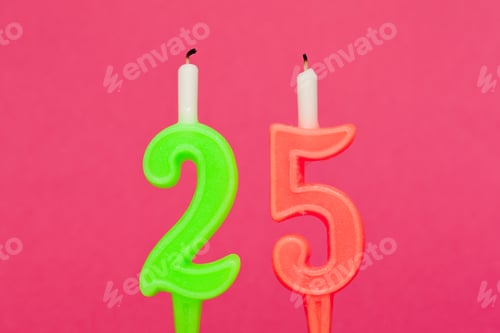 Preview: Colorful birthday candles with the number 25 set against a bright pink background