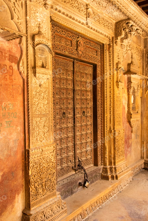 Preview: Old wooden doors of street houses in old town, Jaisalmer, India.