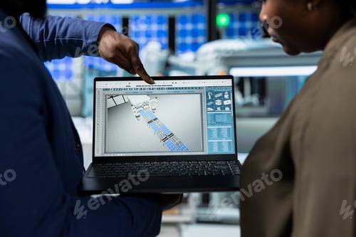 Preview: Industry experts team in suits lead brainstorming session in solar panel factory