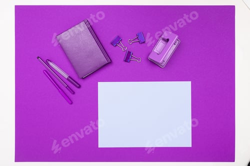 Preview: minimalism concept. stationery on a purple office desk