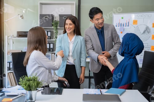 Preview: business people working as a good team in the office. Successful teamwork in a meeting