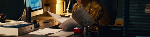 Preview: Reviewing Documents in Office with Computer Screen Visible