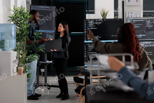 Preview: Software engineers discussing about algorithms on big screen