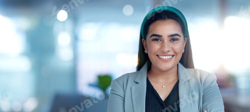 Preview: Face, smile and a confident business indian woman in her office at work looking happy with her corp