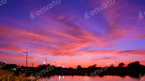 Preview: Twilight sky over shrimp pond in aquaculture livestock farm area with colorful dramatic evening sky