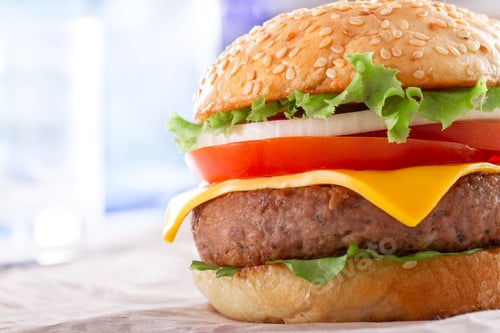 Preview: Beautiful and juicy burger close-up. Food is a series of fast-food.