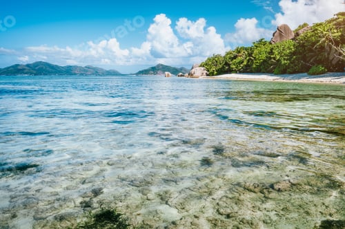 Preview: Vacation holiday on beautiful Anse Source D'Argent beach. Shallow lagoon, granite boulders, La