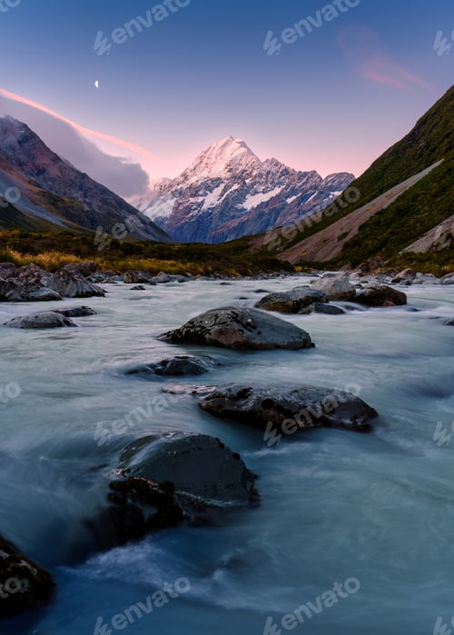 Preview: Sunset sky over Mount Cook with the moon and stream flowing in Hooker Valley Track at New Zealand