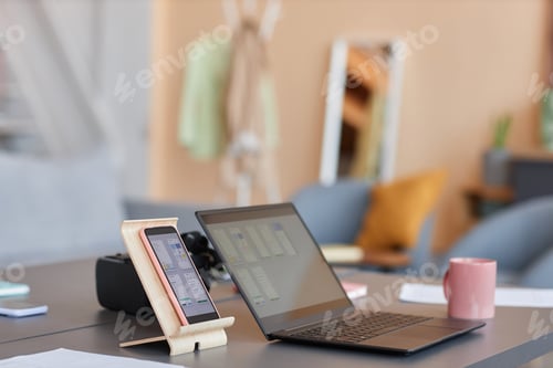 Preview: Background image of computer devices on workplace smartphone and laptop