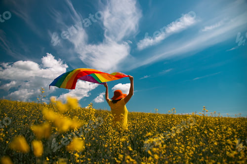 Preview: Young woman with LGBT flag.