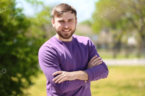 Preview: Portrait of young man in stylish outfit outdoors