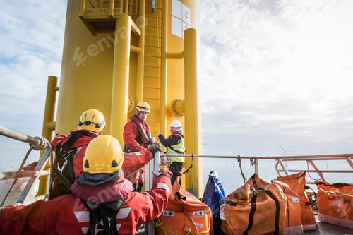 Preview: Engineers preparing to climb wind turbine on offshore windfarm