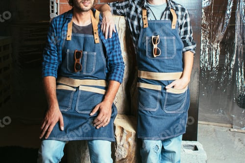 Preview: Crop shot of two craftsmen