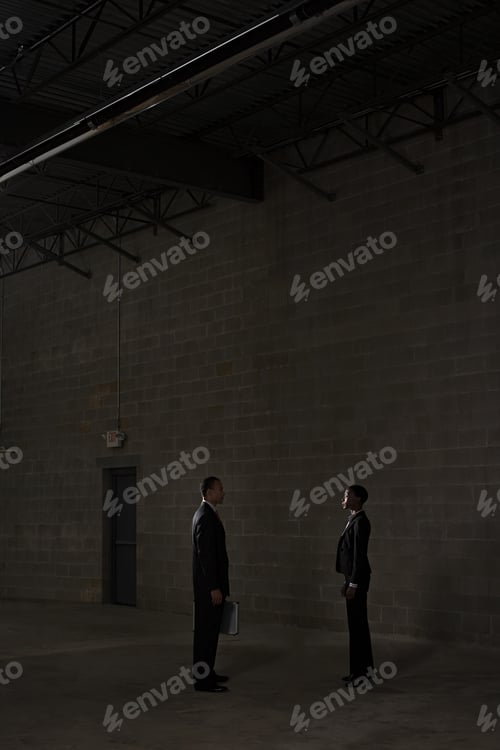 Preview: Businesspeople in warehouse