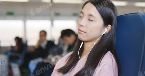 Preview: Woman sleeping on ferry and listen to music