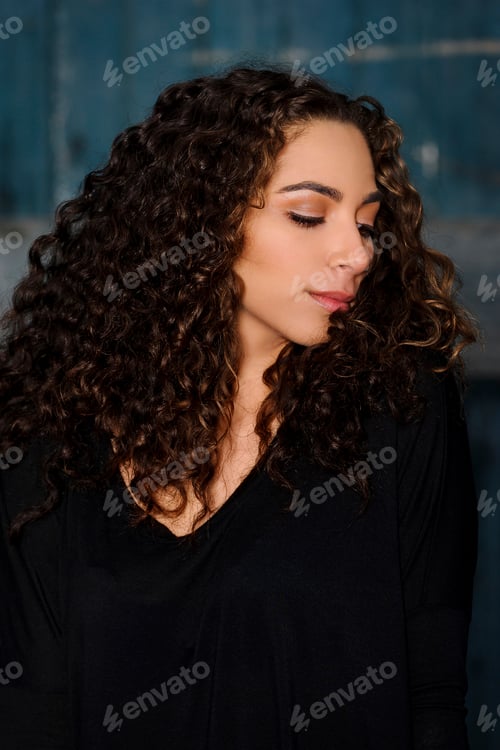 Preview: Mixed race woman standing outdoors