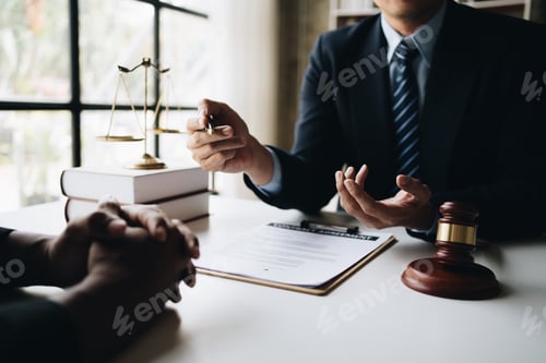 Preview: Close up view of professional lawyer explain the details of the contract for his client in office ro