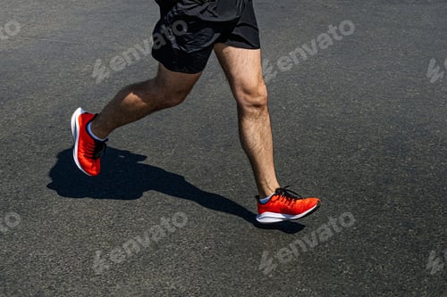 Preview: legs runner man in bright orange shoes