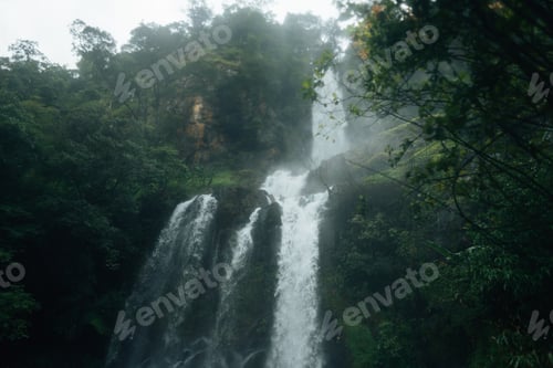 Preview: Waterfalls in the natural rainforest during the rainy season and mist from rain and waterfalls