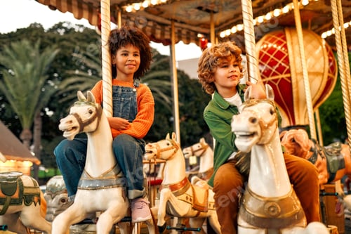 Preview: Kids having fun on a carnival Carousel