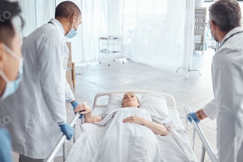 Preview: Doctors, face mask and push woman in bed for emergency surgery for cancer. Medical professional, te