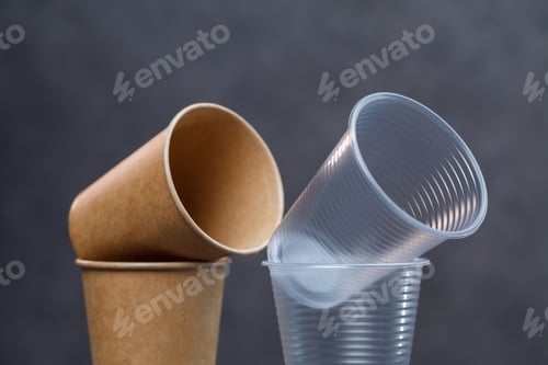 Preview: Eco-friendly disposable tableware made of bamboo wood and paper on a gray background. Plastic