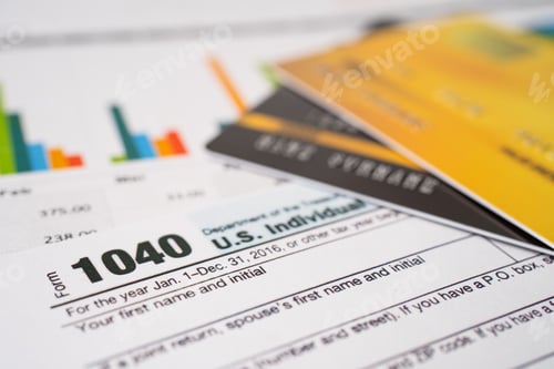 Preview: Tax Return form 1040 and dollar banknote, U.S. Individual Income.