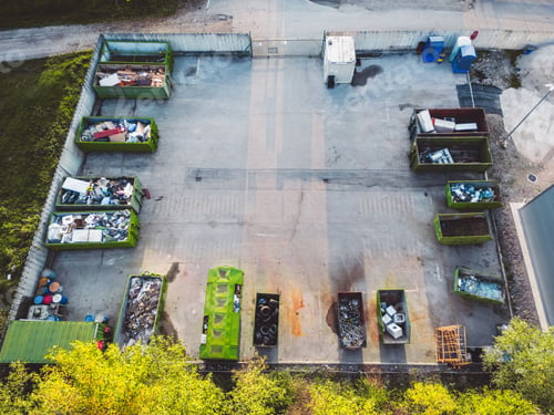 Preview: Top down view of waste assortment center with containers for different trash