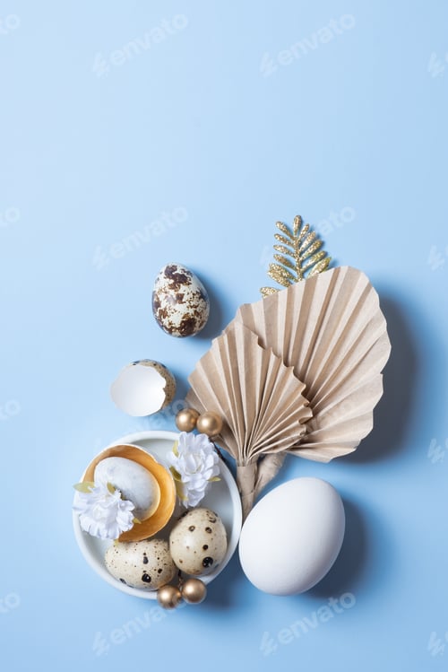 Preview: Modern creative composition with easter eggs, palm leaves and flowers top view. Easter flat lay
